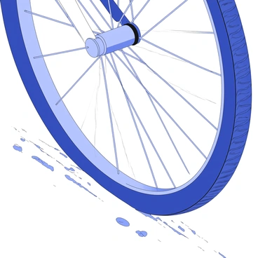 A close-up view of a bicycle wheel positioned on a rough road surface. The tire has a textured tread pattern, showcasing deep grooves and ridges designed to enhance grip. Dust particles and small stones can be seen embedded in the rough terrain. The bicycle wheel is in motion, with a slight blur around the edges to depict speed. The spokes of the wheel are clearly visible, creating a radial pattern, while the rim is made of shiny metal. The roughness of the road contrasts with the smoothness of the wheel, emphasizing the interaction between the two surfaces.