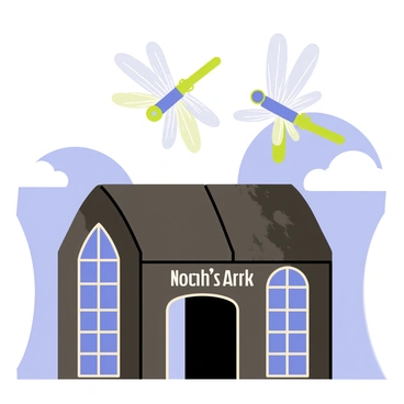 A pair of dragonflies with vibrant green and blue bodies are hovering above "Noah's Ark." Their wings are transparent and glistening in the sunlight, catching the light and creating a shimmering effect. The ark is crafted from dark wood, with a prominent curved roof and large windows. In the background, there are fluffy white clouds in a blue sky. The dragonflies are positioned close together, adding a sense of movement above the ark.