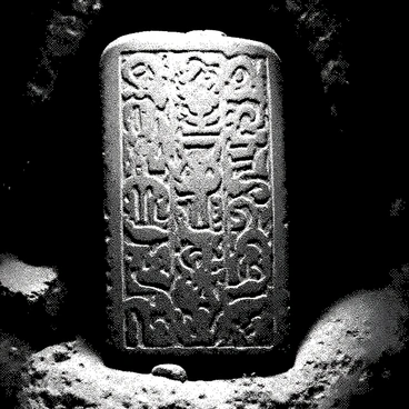A weathered stone tablet is positioned center stage, showcasing its rough, textured surface. Ancient runes are intricately carved into the stone, their shapes varying in design. The runes are depicted with a bright, glowing effect, creating a stark contrast against the dark, shadowy interior of the cave surrounding the tablet. The cave walls are uneven and rugged, illuminated subtly by the light emanating from the runes, casting faint shadows and highlighting the stone's contours. The atmosphere is dense and mysterious, drawing attention to the tablet and the enigmatic symbols upon it.