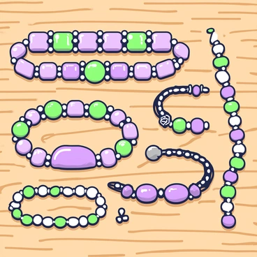 A colorful collection of gemstone bracelets arranged on a wooden table