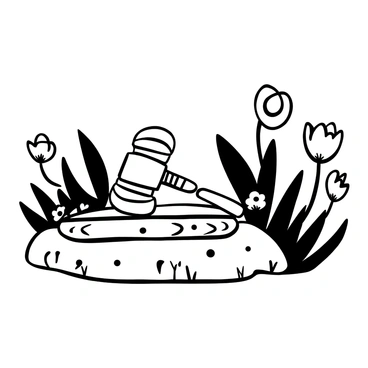 A gavel resting on a bed of soft grass and flowers