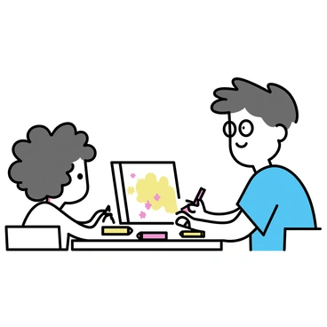 An adult and a child sitting side by side at a small wooden table. The adult is wearing a blue t-shirt and glasses, smiling as they assist the child. The child, with curly hair, is focused on coloring with a bright red crayon. A sheet of white paper on the table features a partially completed drawing of a sunny sky with trees and flowers. Various crayons in an array of colors are scattered across the table, adding vibrancy to the scene.