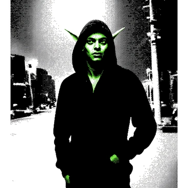 A modern goblin with green skin and pointed ears is standing under a city streetlight. The goblin is wearing a loose-fitting black hoodie that obscures part of its face, casting shadows on its features. Its eyes, bright and mischievous, peek out from the hood. The streetlight emits a soft glow, illuminating the surrounding concrete pavement. The background features blurred outlines of buildings, hinting at an urban environment. The goblin's posture is relaxed, with one hand tucked into a pocket and the other resting at its side.