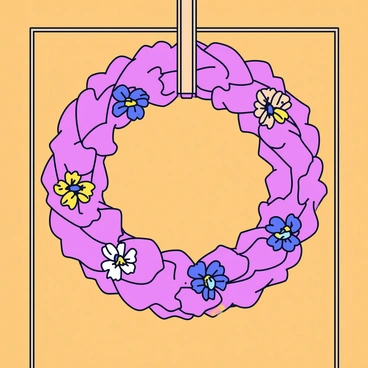 A decorative wreath made from dried rhubarb leaves arranged in a circular form. The wreath is adorned with small clusters of colorful dried flowers interspersed among the leaves. It is elegantly hung on a wooden door with a simple twine loop. The door has a natural wood texture, complementing the earthy tones of the wreath.