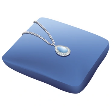 A delicate slinga necklace with a sparkling pendant displayed on a velvet cushion