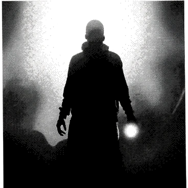 A shadowy figure is partially obscured by a dense fog. The figure stands with an upright posture and is holding a glowing artifact in one hand. The light from the artifact casts a faint illumination, highlighting the contours of the figure's silhouette. The fog swirls around the figure, creating an atmosphere of mystery and intrigue. The surrounding area is indistinct, further emphasizing the presence of the figure and the artifact in a dramatic, shadowy scene.