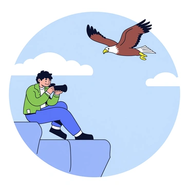 A photographer with a black camera is positioned on a rocky cliff. The photographer, wearing a green jacket and holding the camera up to their eye, is focused intently on capturing the moment. In the sky above, a majestic eagle is soaring with its wings outstretched. The eagle has a brown body with a white head, displaying its sharp beak and keen eyes as it glides gracefully through the air. The background features a clear blue sky with a few wispy clouds.