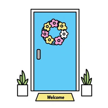 A front door painted in a soft blue color, featuring a colorful floral wreath with red, yellow, and white flowers hanging prominently on it. Below the door, there is a rectangular welcome mat with the word "Welcome" written in an elegant font. The door has a brushed silver doorknob and is set within a white frame, complemented by a small potted plant on either side of the entrance.